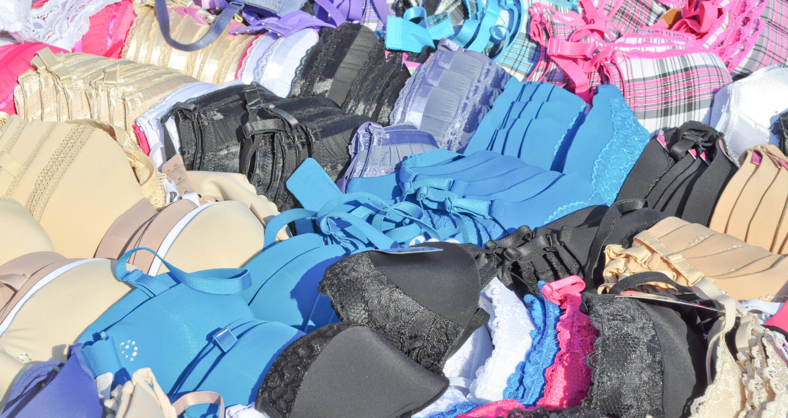 Lots of bra's on a market stall